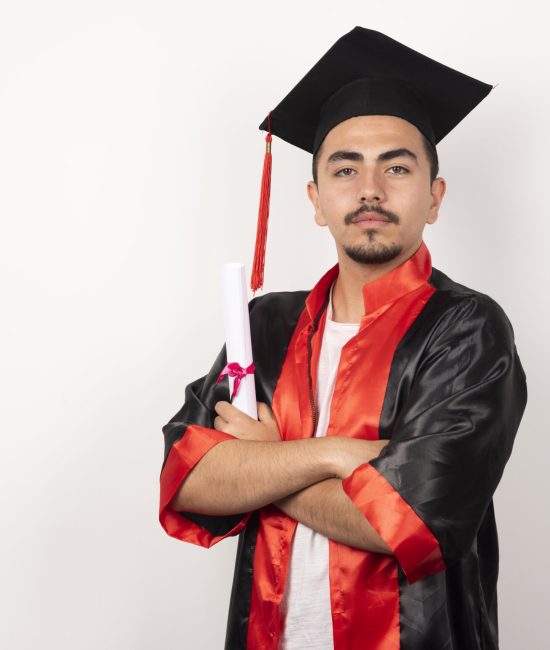 Young male student with diploma posing on white background. High quality photo